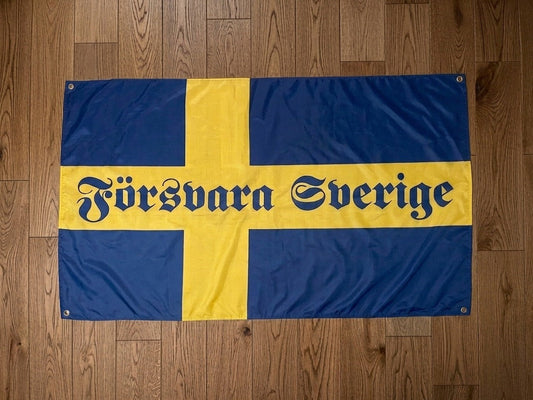 Dekorativ flagga 'Försvara Sverige' | 150 × 90 cm